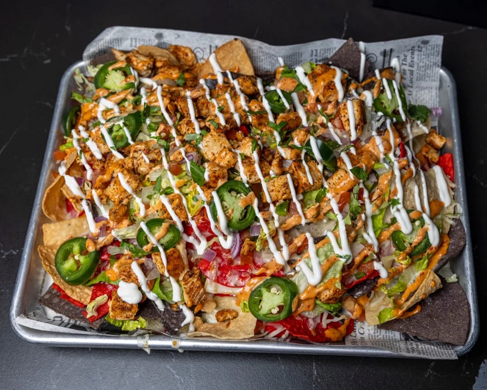 Loaded dirty nachos with all the toppings